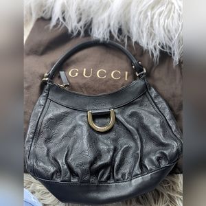 Gucci leather monogram saddle bag